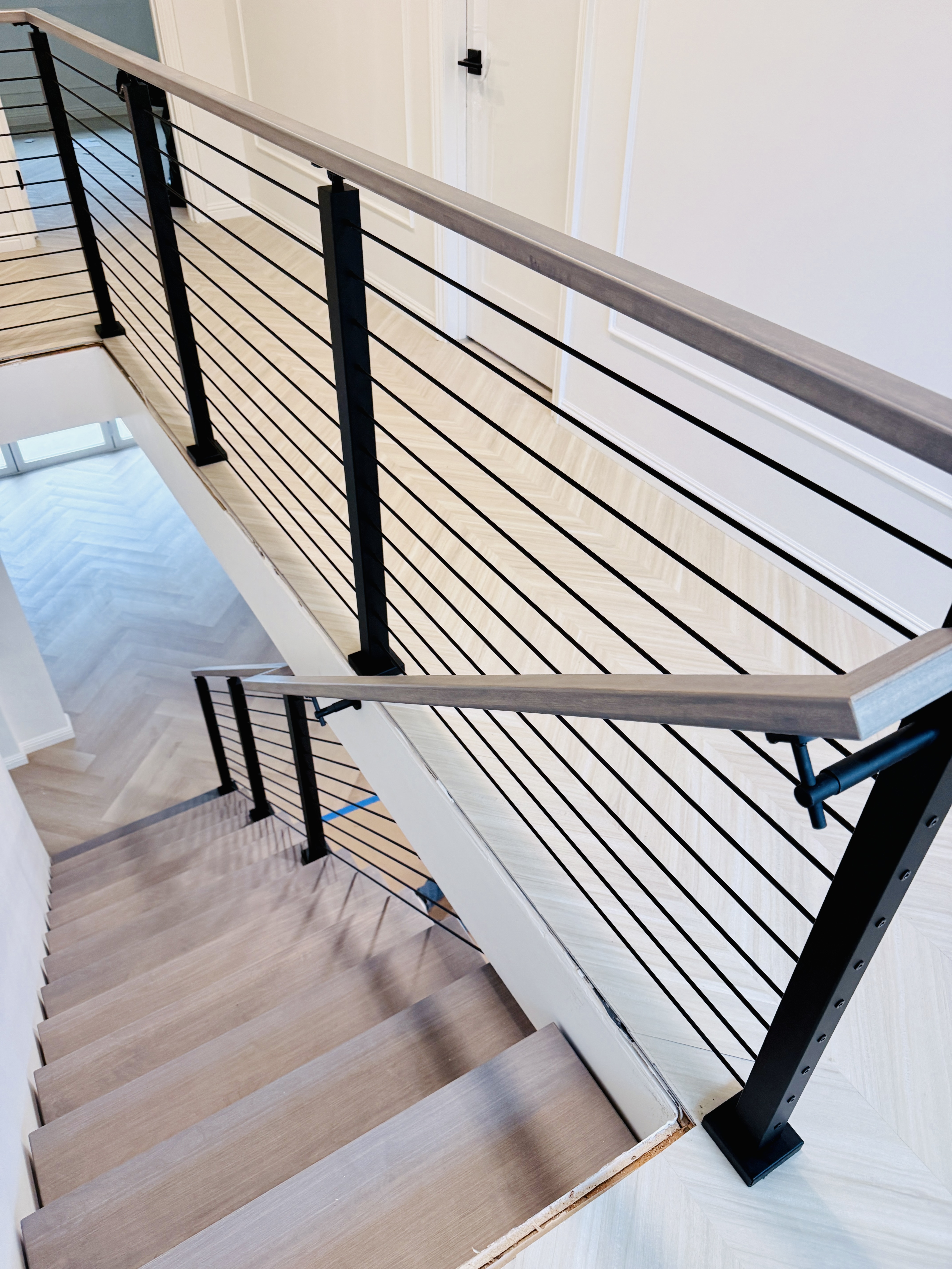 Rough Railing Rod Railing with Ceiling Termination | Vantage Stairs & Railing