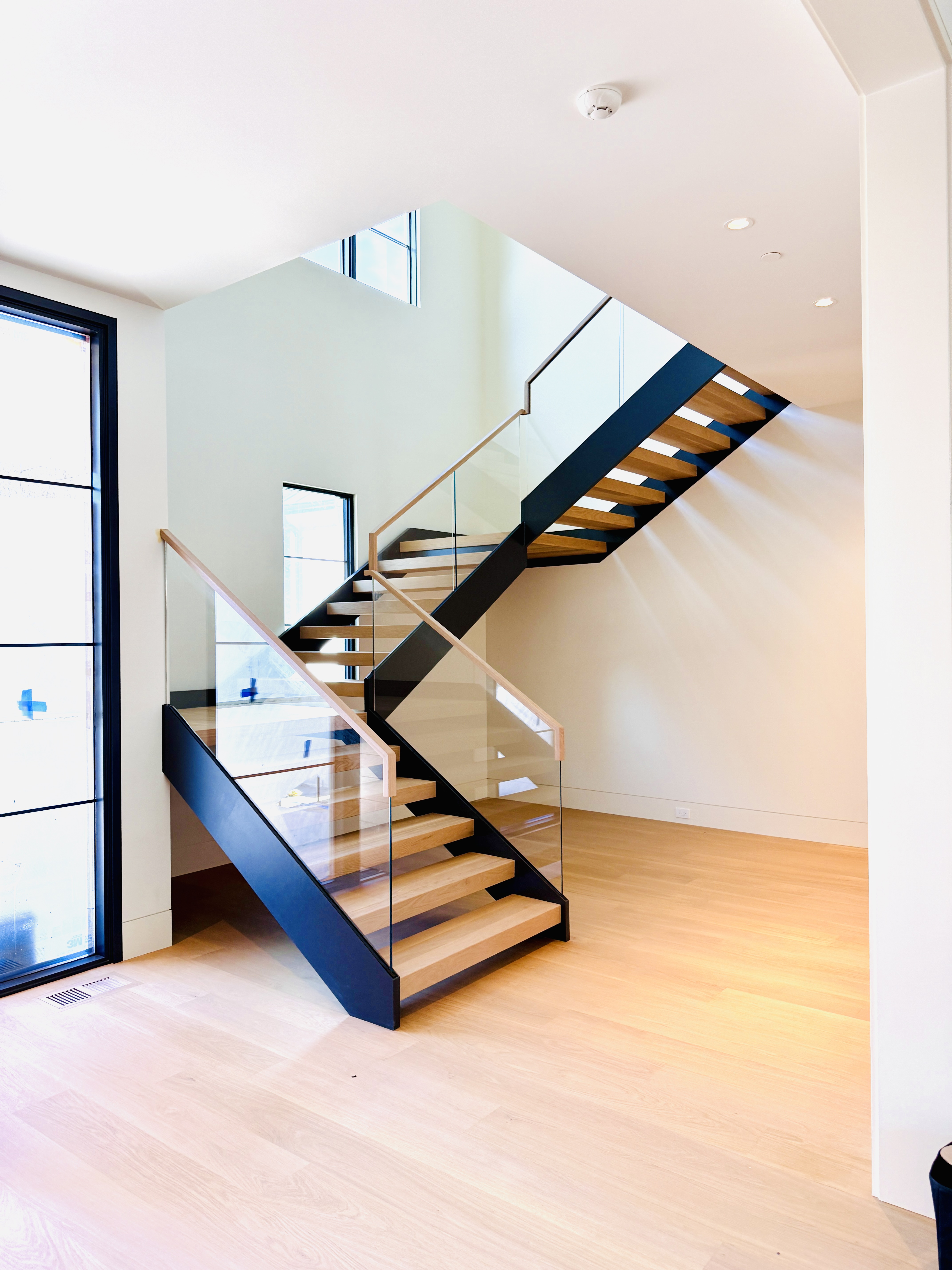 Top Cap Railing Glass Railing with Continuous white oak top cap | Vantage Stairs & Railing