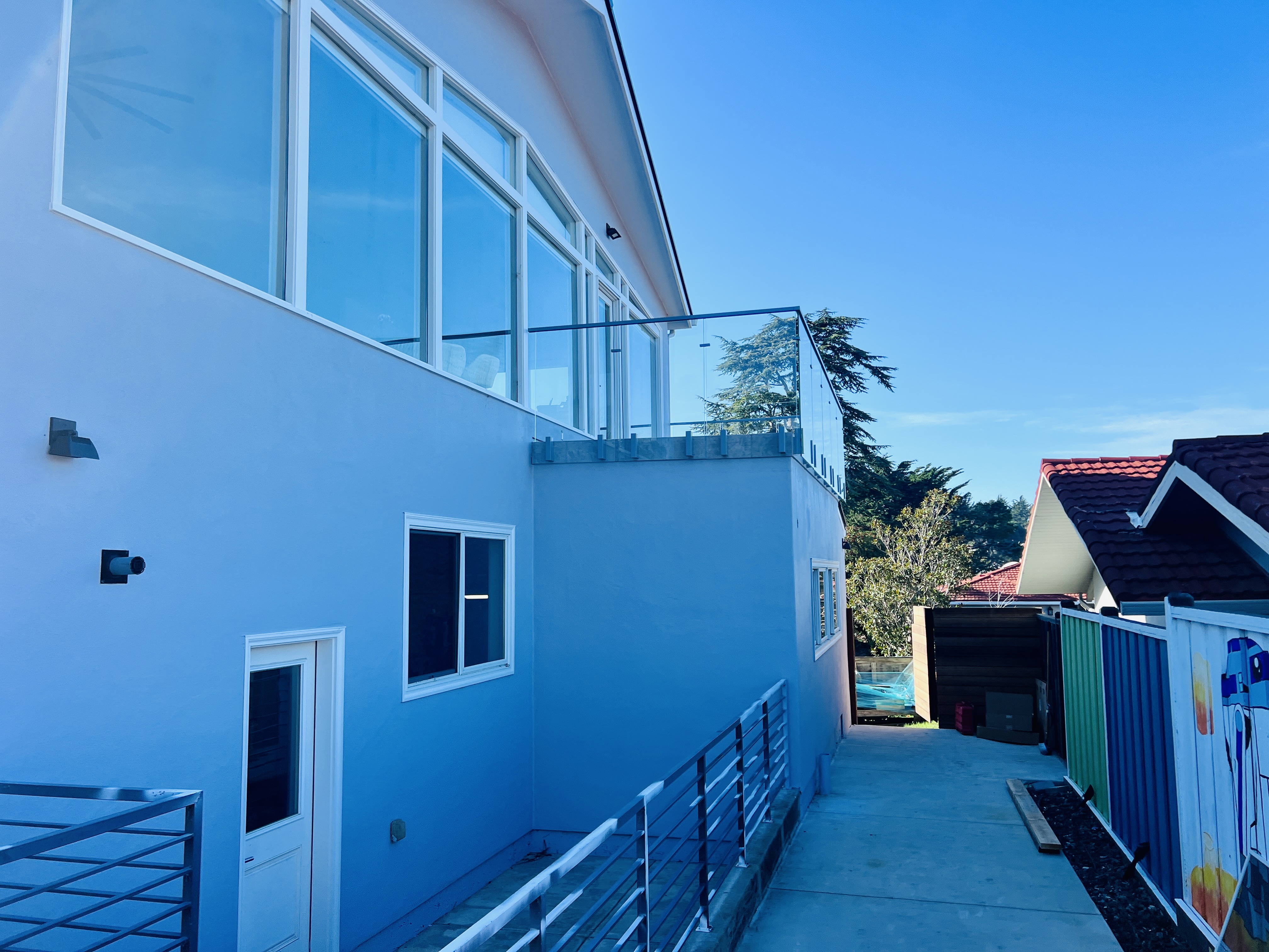 Glass Railing On Side Side-mounted Glass Railing with Glass Gates | Vantage Stairs & Railing