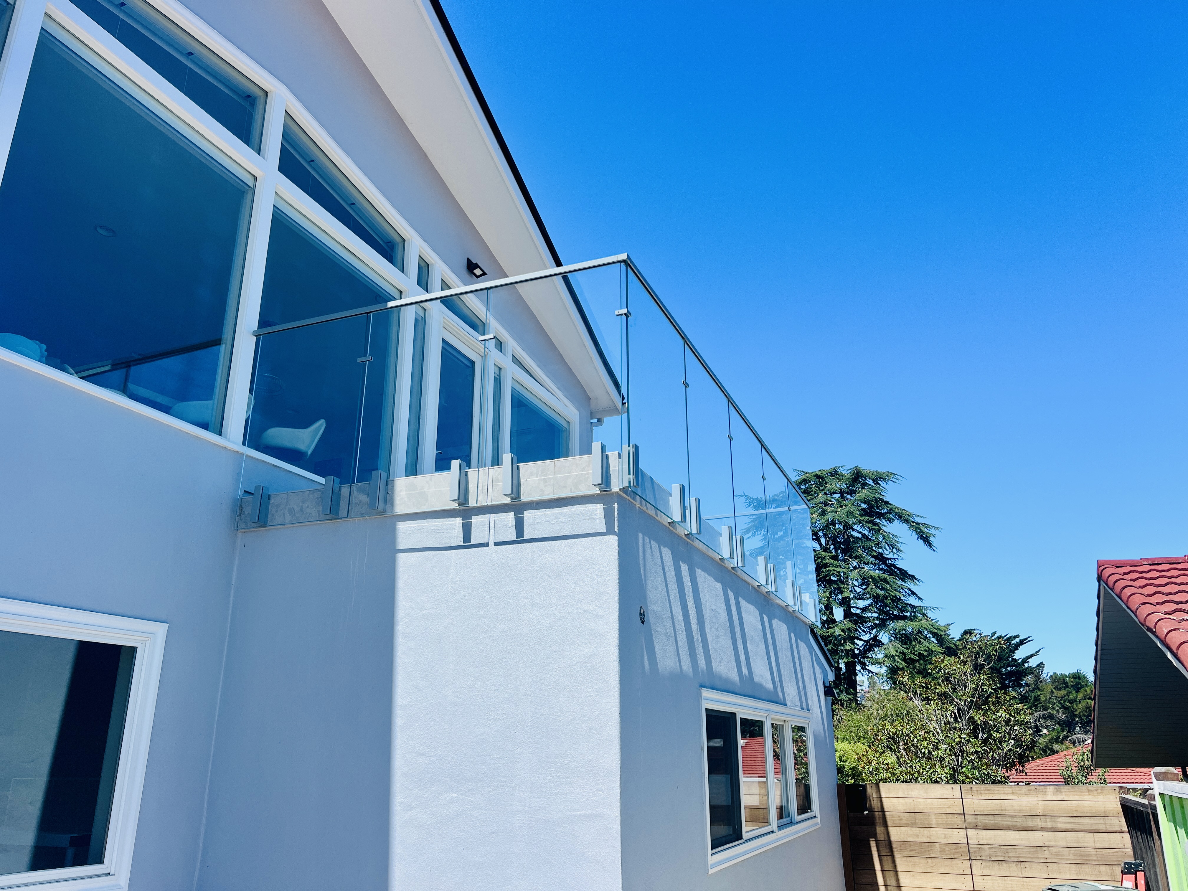 Glass Railing On Side Side-mounted Glass Railing with Glass Gates | Vantage Stairs & Railing
